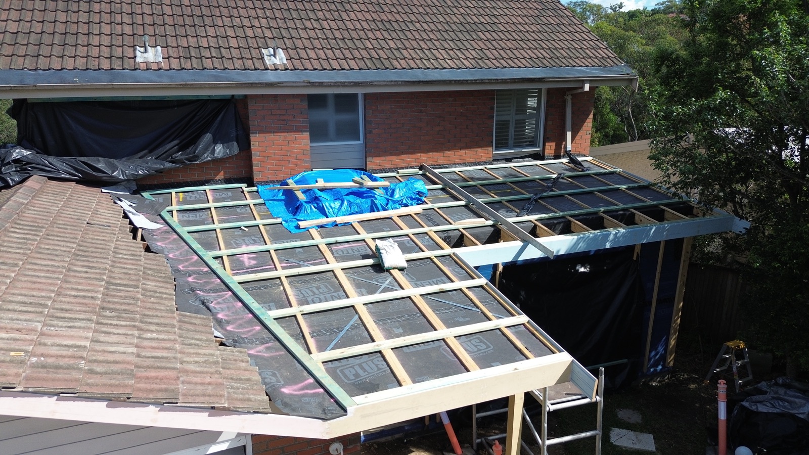 Aerial view of the roof framing over the new front extension of the Frenchs Forest home