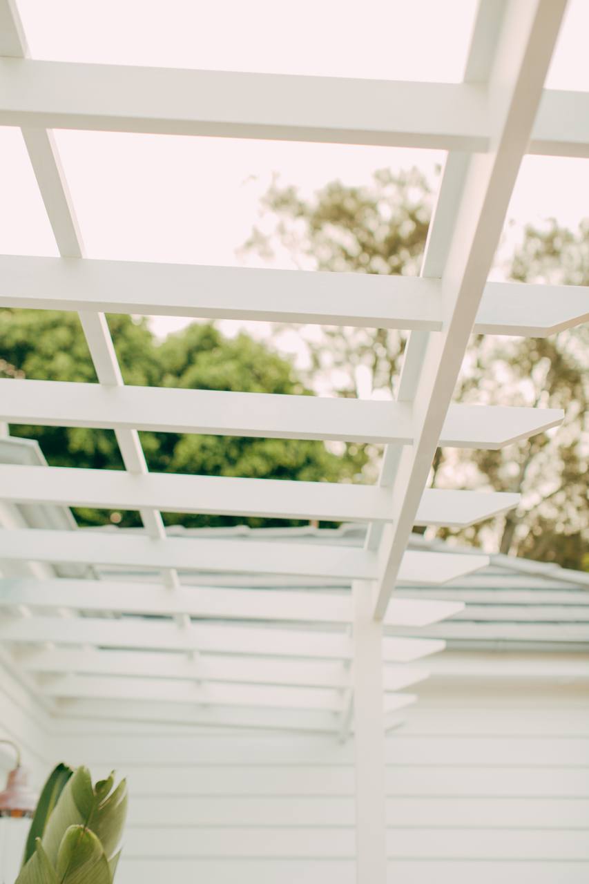 Pergola rafters against the sky at the North Narrabeen home