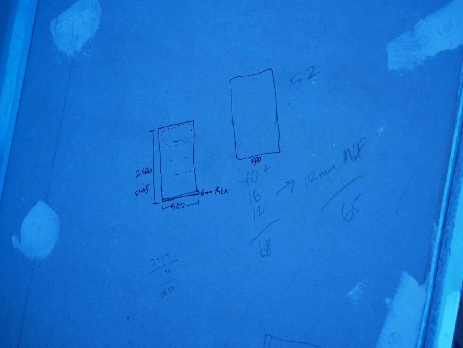 Pencil measurements and sketches worked out on the plasterboard during the Redfern terrace renovation